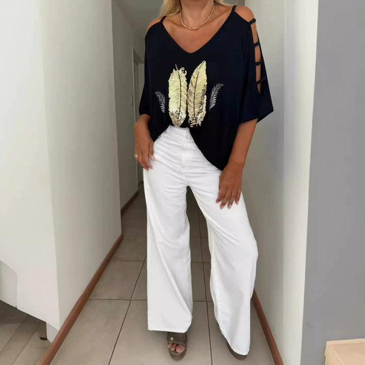 Dame Oversized T-shirt med kreative cut-outs og iøjnefaldende tryk Stilla