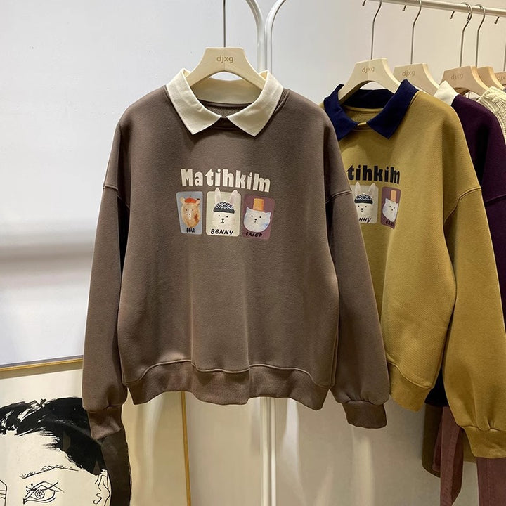 Femme Cozy Graphic Sweatshirt med stilfuld kontrastkrave Stilla