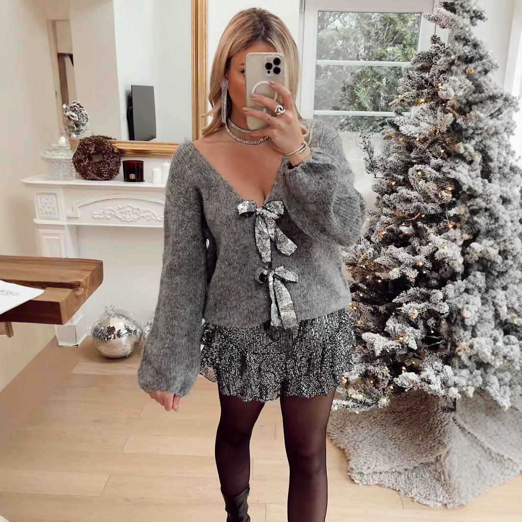 Kvindernes løse strikket cardigan med elegante bånddetaljer Stilla