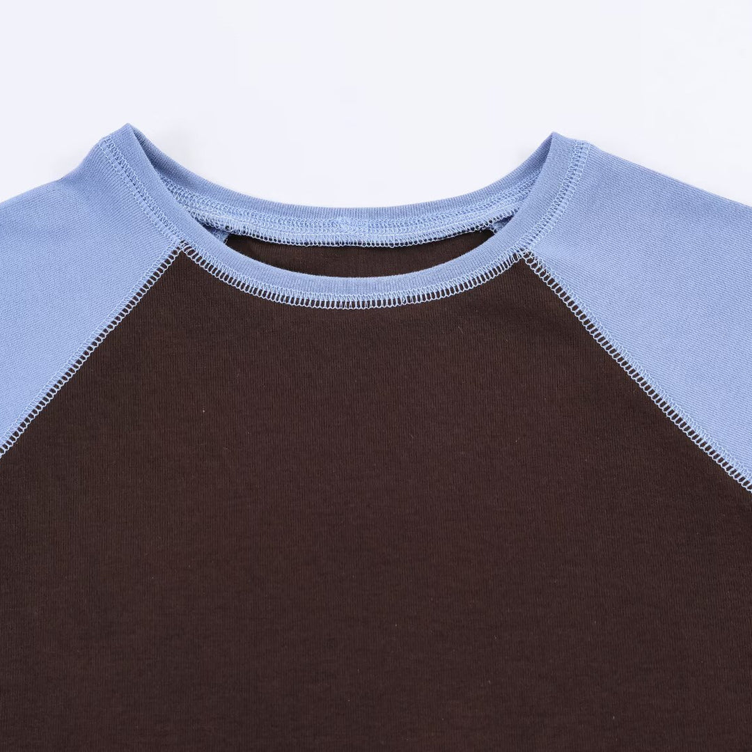 Dame Sporty T-shirt med kontrastærmer og afslappet snit Skovae