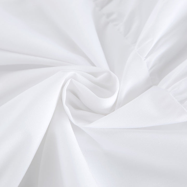 Dame afslappet sommerkjole med voluminøse flæsedetaljer og elegant udskæring Stilla