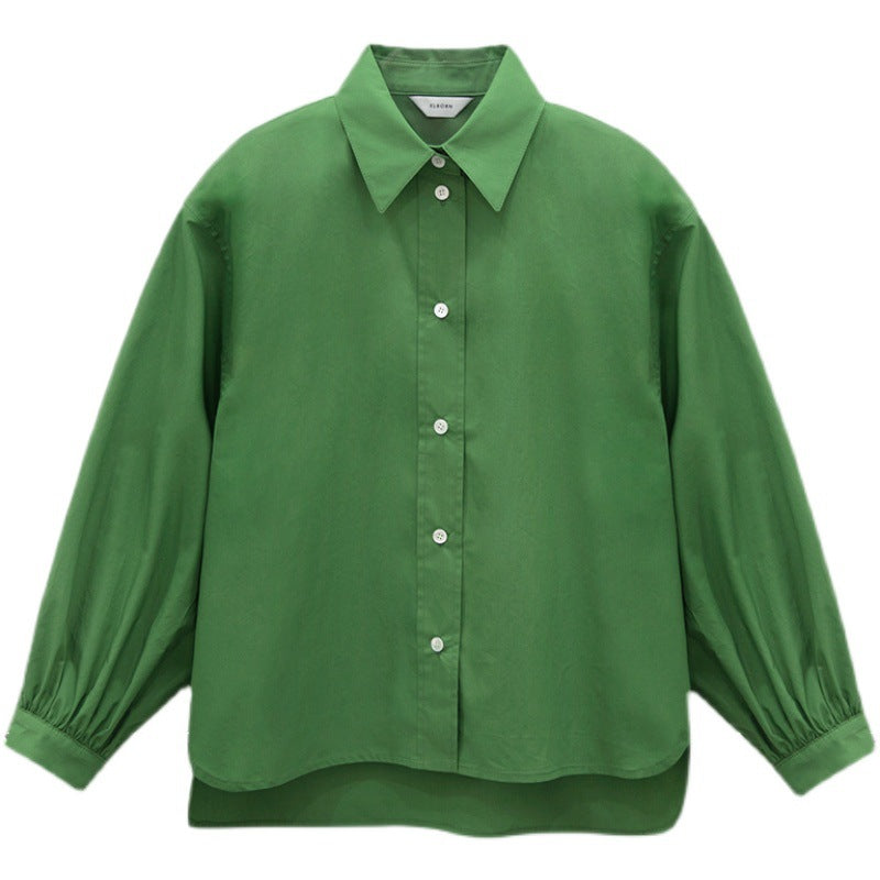 Damebluse med voluminøse ærmer og klassiske knapdetaljer Stilla