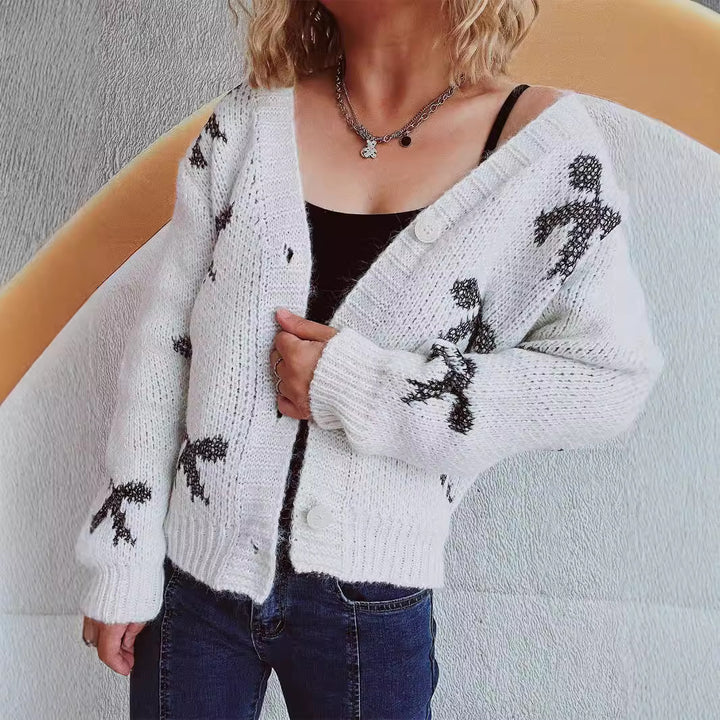 Kvinders cardigan med geometrisk ternet mønster og bløde materialer Stilla
