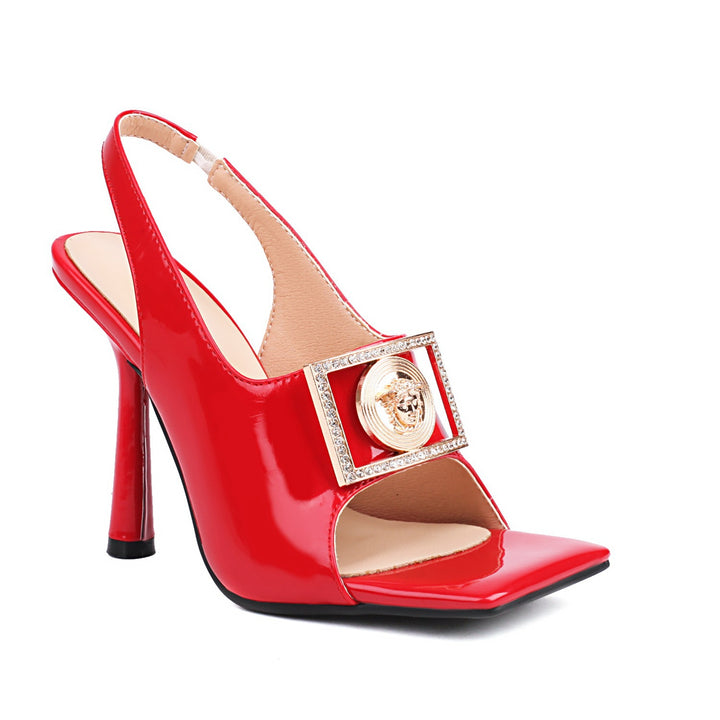 Femme Open-Toe Slingback-Hæle med dekorativt logo-tryk Stilla