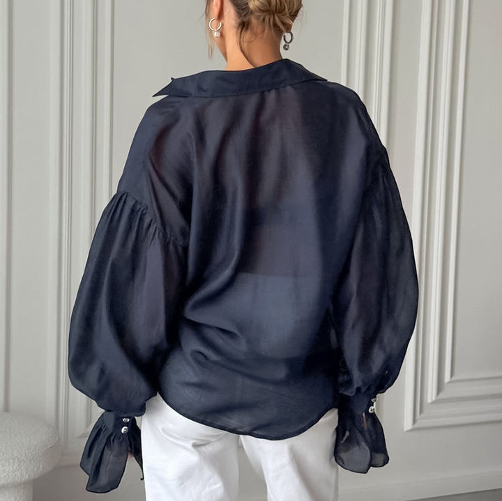 Dame Gennemsigtig Bluse med Puffærmer og Knapdetaljer Stilla