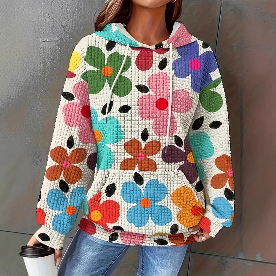 Dame hættebluse med blomsterdesign og struktureret stof Stilla