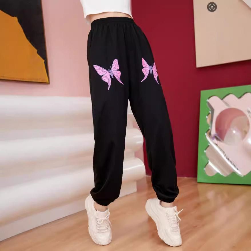 Dame joggingbukser med farverigt sommerfuglemotiv Stilla