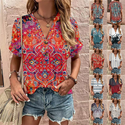 Damebluse med blomsterdesign og knaplukning Stilla