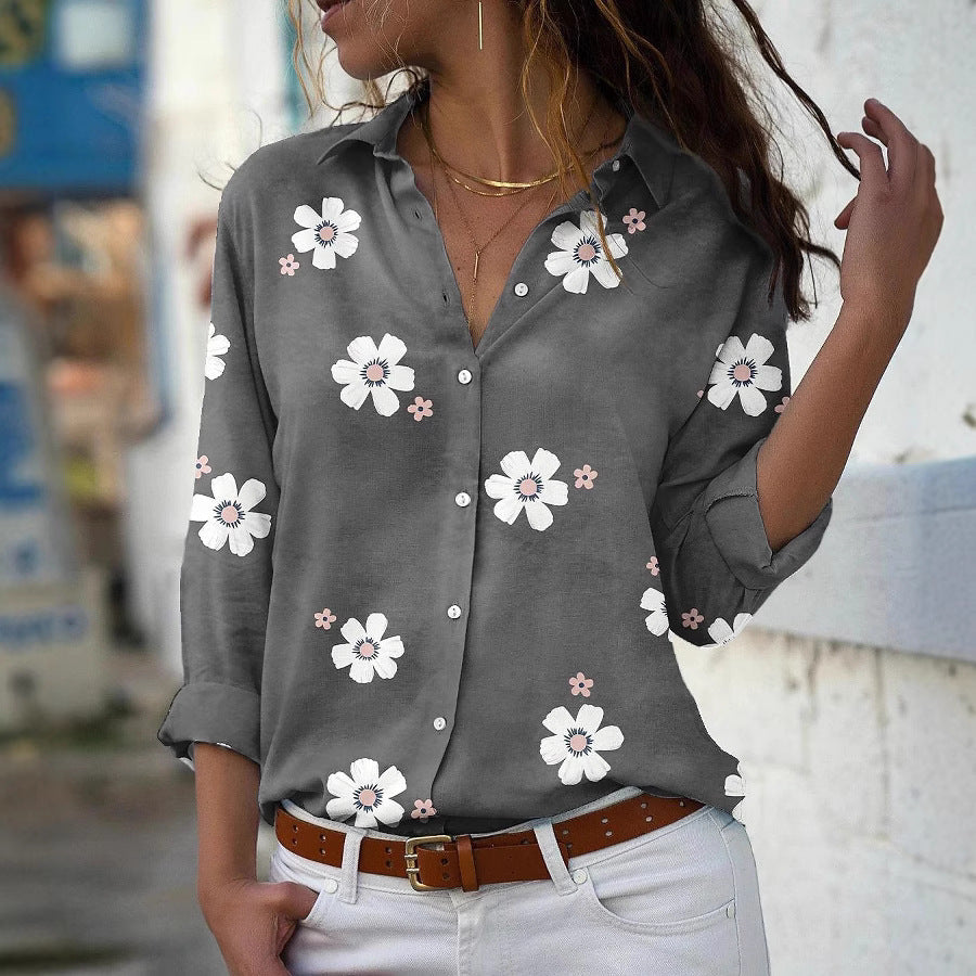 Damebluse med blomsterdesign og elegant krave Stilla