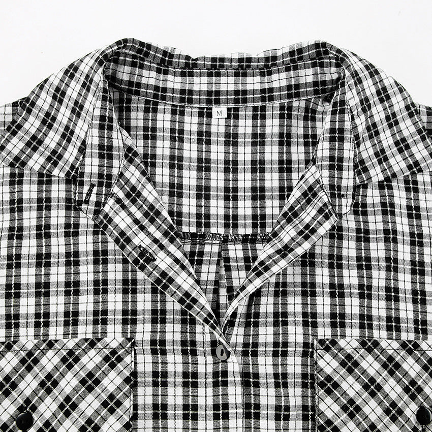 Dame Oversized Ternet Bluse med afslappet snit og praktiske lommer Stilla