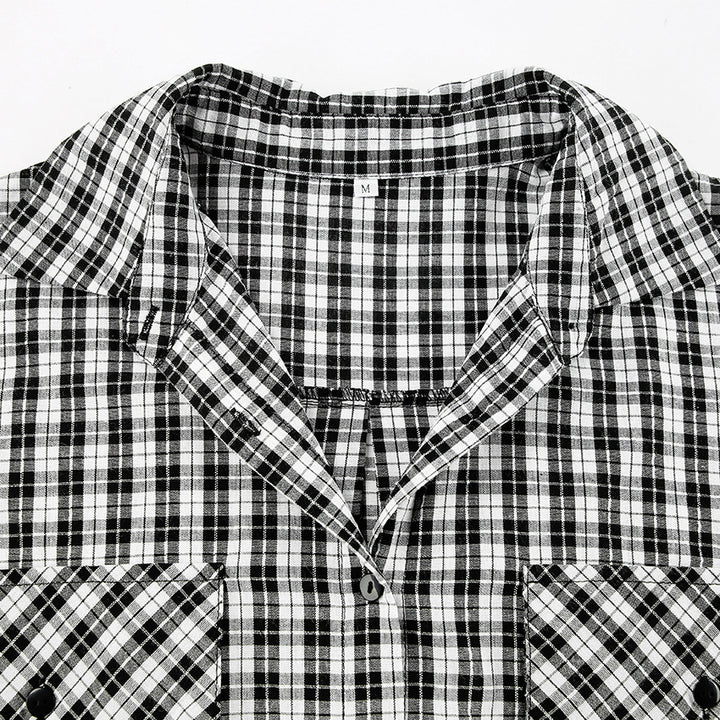 Dame Oversized Ternet Bluse med afslappet snit og praktiske lommer Stilla
