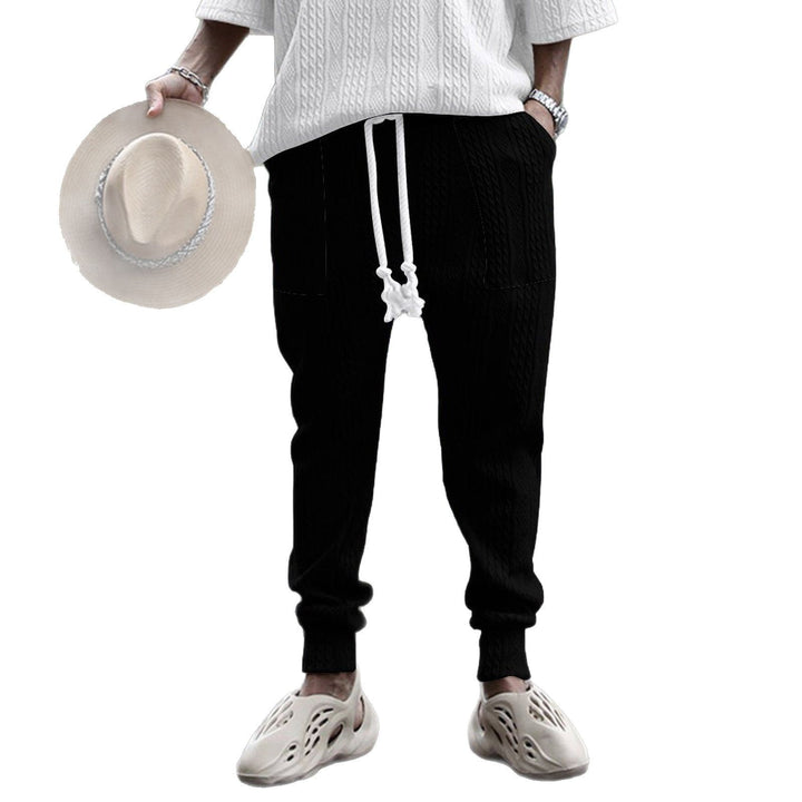 Herrer afslappet sommeroutfit med palmemotiveret overdel og åndbare joggingbukser Stilla