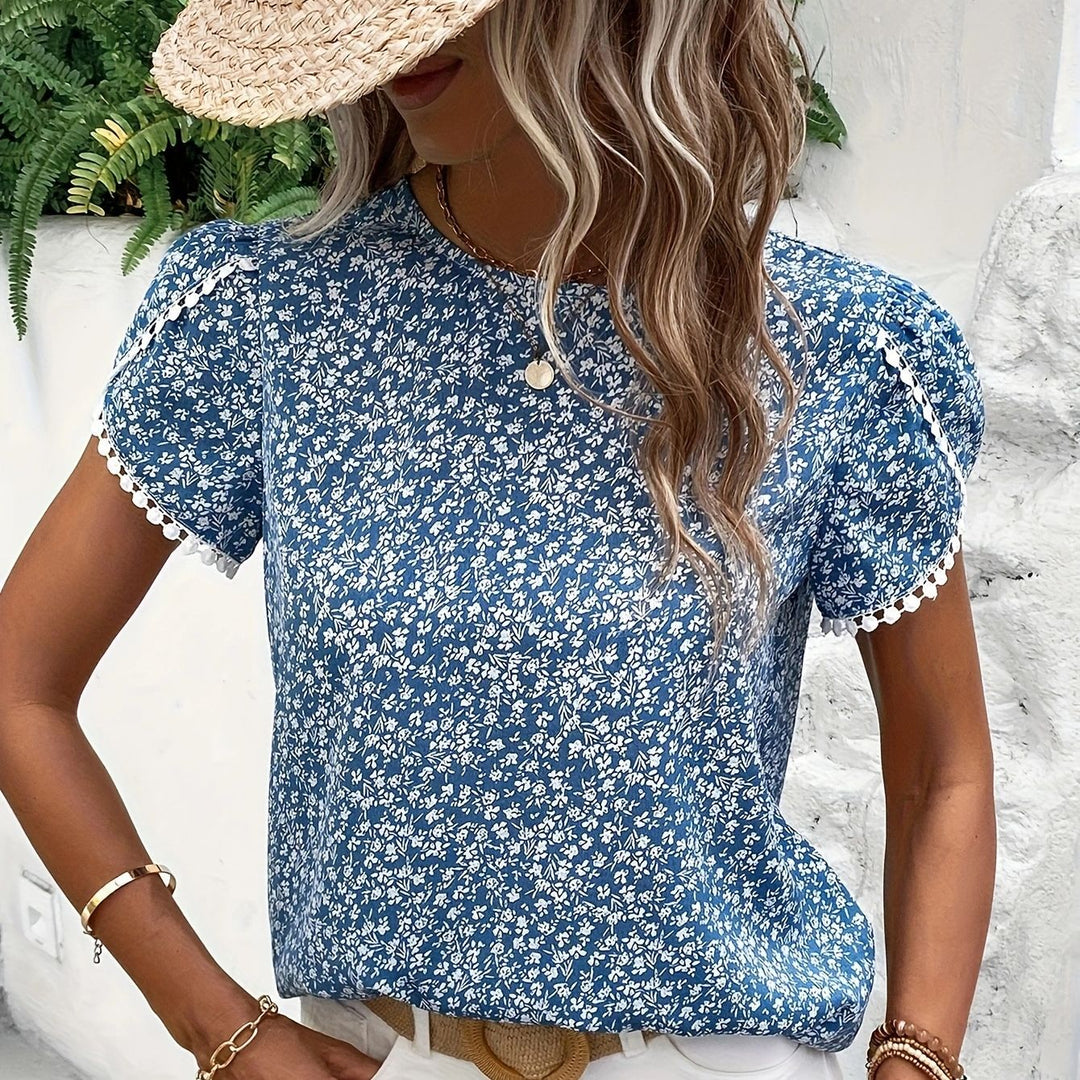 Dame blomsterprintet kortærmet bluse med puffærmer Stilla