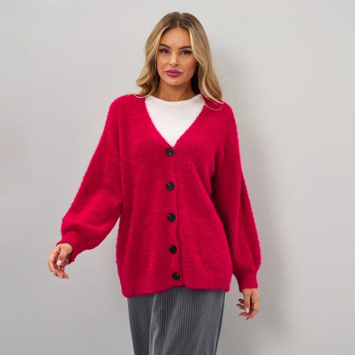 Kvinders hyggelige cardigan med asymmetrisk snit og knaplukning Stilla