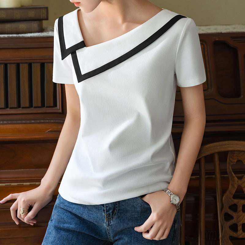 Dame elegant top med en moderne asymmetrisk krave og stilfulde kontrastaccenter Stilla