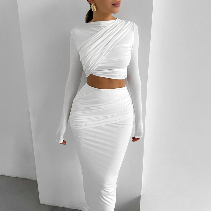Dame Elegant og tætsiddende crop-top med lang nederdel og raffinerede rynkeelementer Stilla