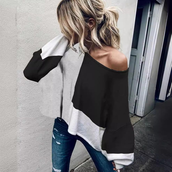 Damerne mode oversized sweater med unik snit og kontrasterende farveblokke Stilla