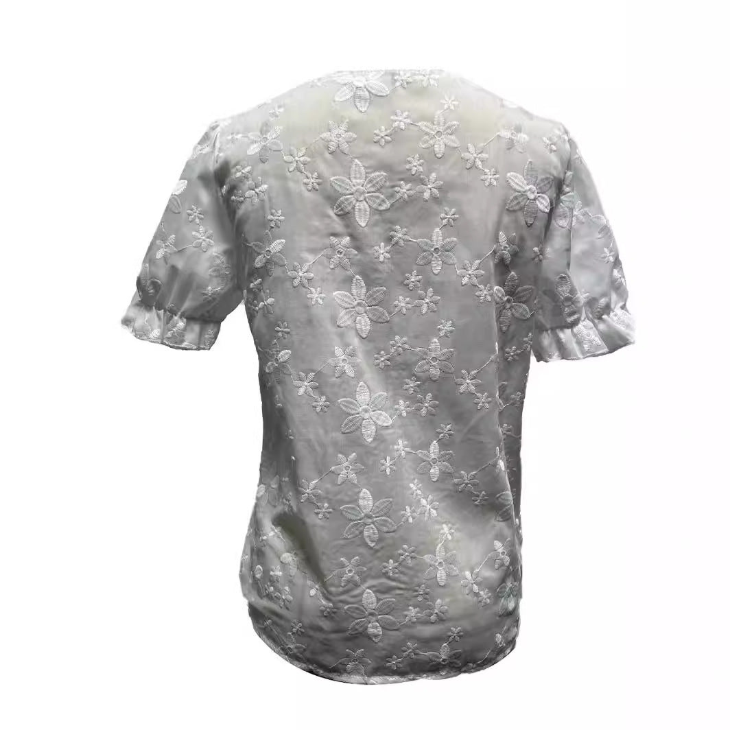 Damebluse med romantisk blomsterdesign Stilla