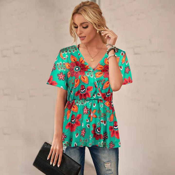 Damebluse i legende floraldesign med taljering Stilla