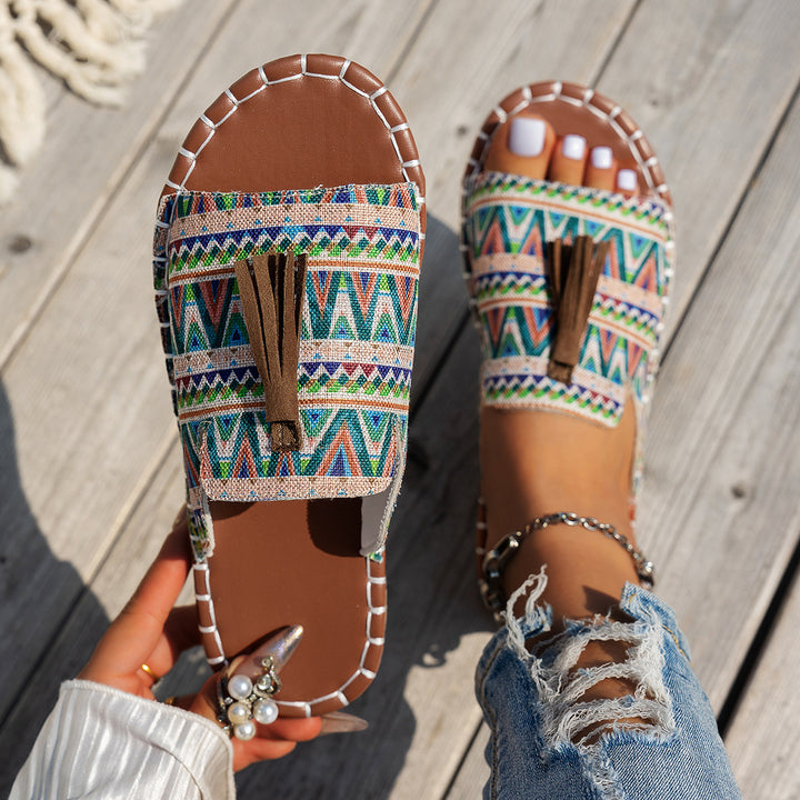 Dame slide-sandaler med farverigt vævdesign og fashionable kvaster Stilla