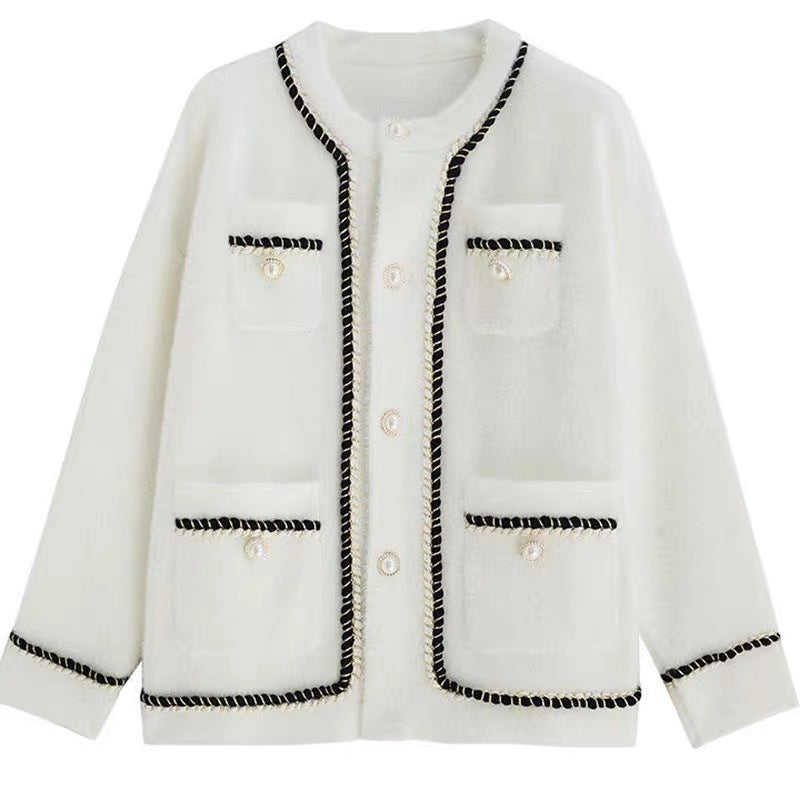 Kvindernes elegante cardigan med kontrasterende detaljer og lommer Stilla