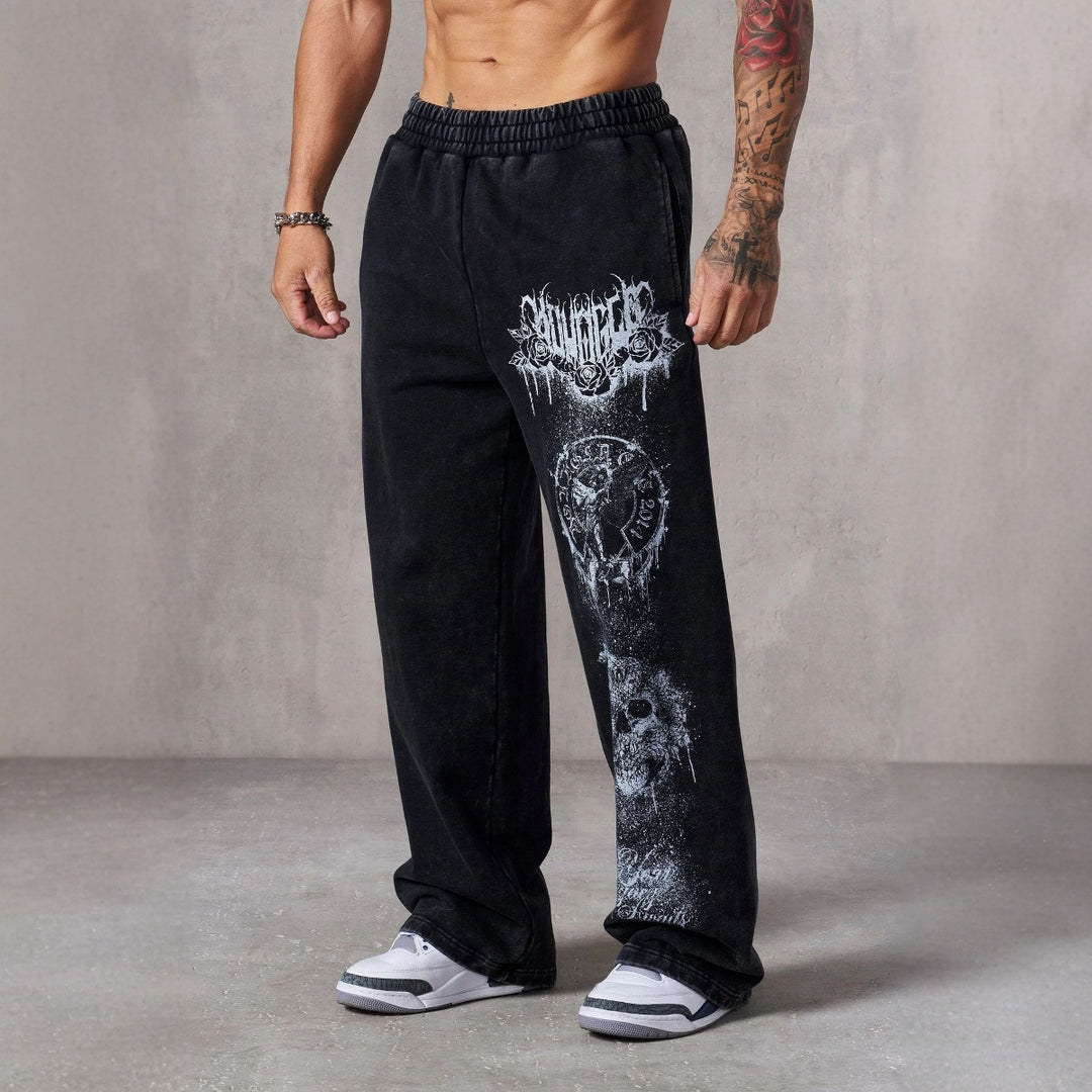 Herrer nan brede joggingbukser med elastisk talje, sidelommer og detaljeret kranium- og rosenmotiv Skovae