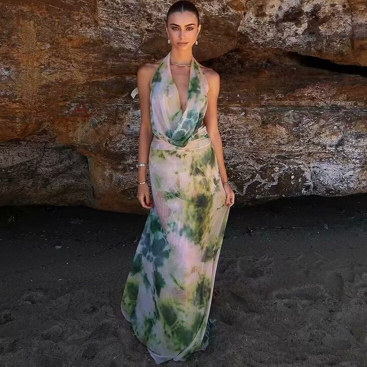 Femme Elegantes Maxi-kjole med dyb V-hals og flydende silhuet Stilla