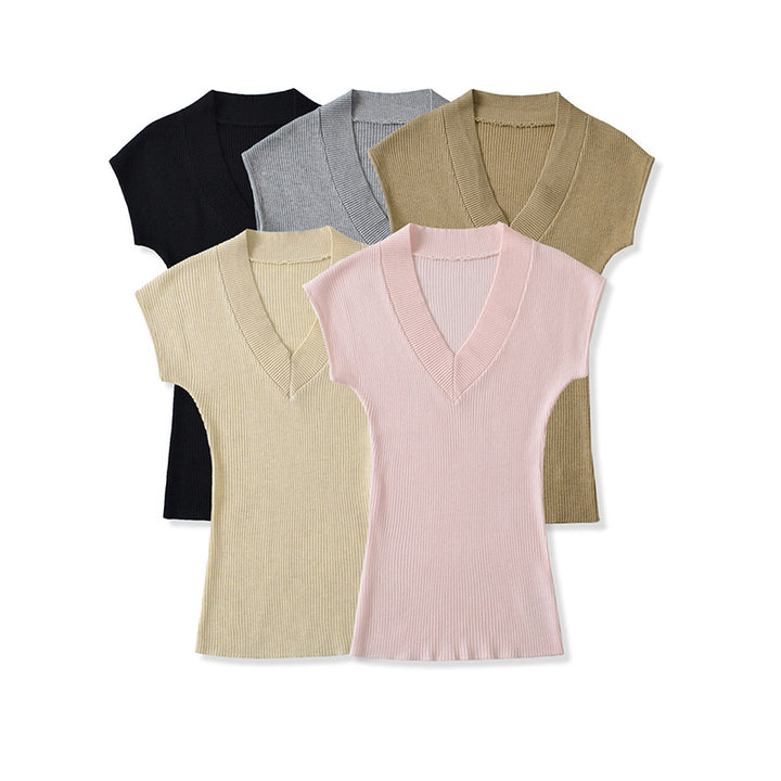 Dame figursyet V-hals top i elastisk materiale Stilla