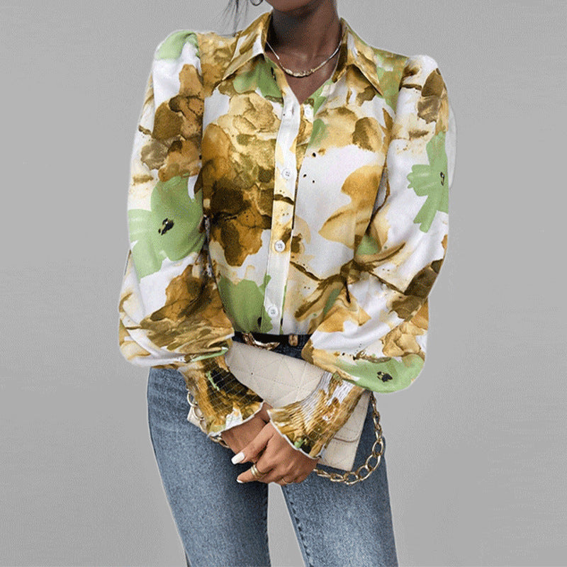 Damebluse med blomstertrykt og puffærmer Stilla