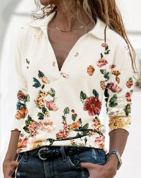 Damebluse med blomsterdesign og polo-krave Stilla