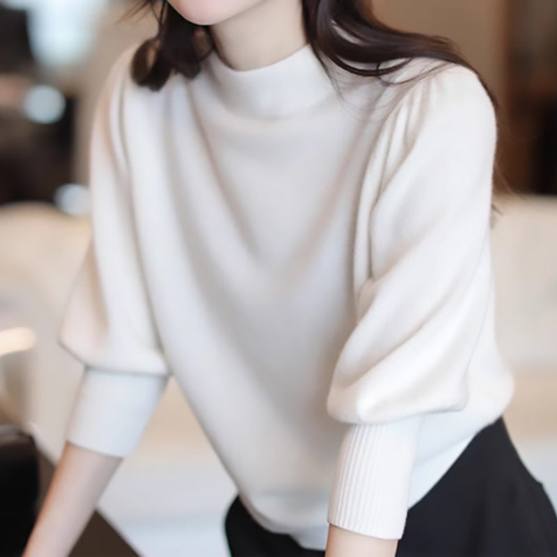 Dame elegant rullekrave sweater med voluminøse ærmer og ribdetaljer Stilla
