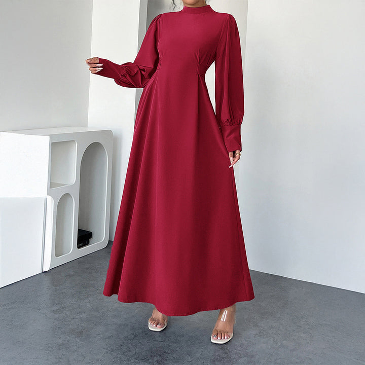 Dame maxikjole med elegante pufærmer og figursyet silhuet Stilla