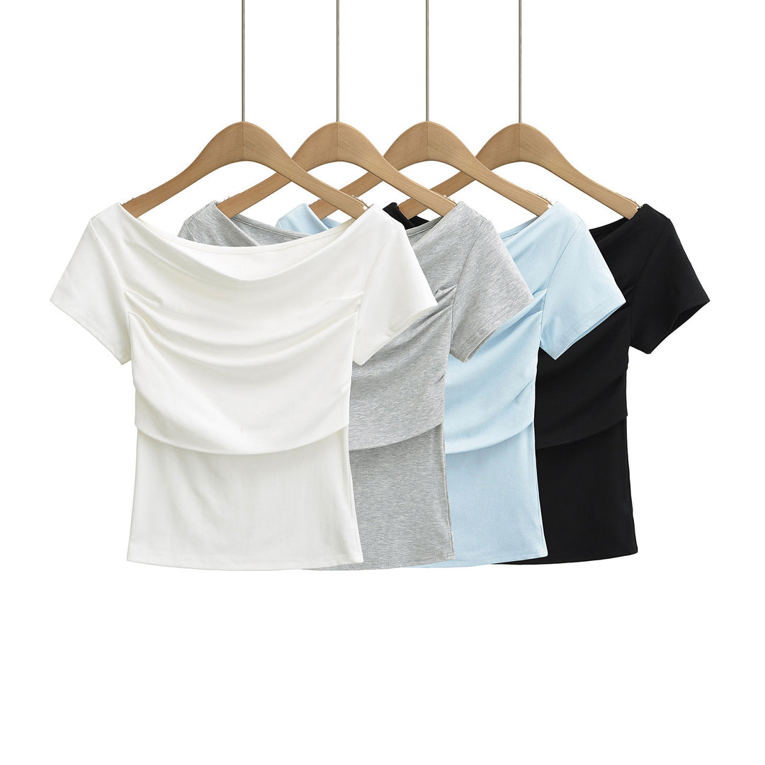 Dame afslappet crop-top med elegant off-shoulder-design og raffineret drapering Stilla
