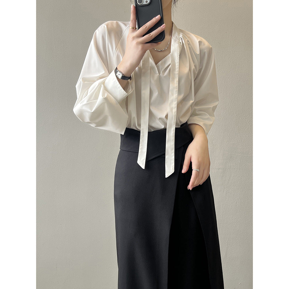 Dame elegant blouse med sløjfedetalje og fint satin-finish Stilla