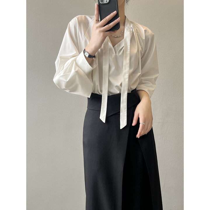 Dame elegant blouse med sløjfedetalje og fint satin-finish Stilla