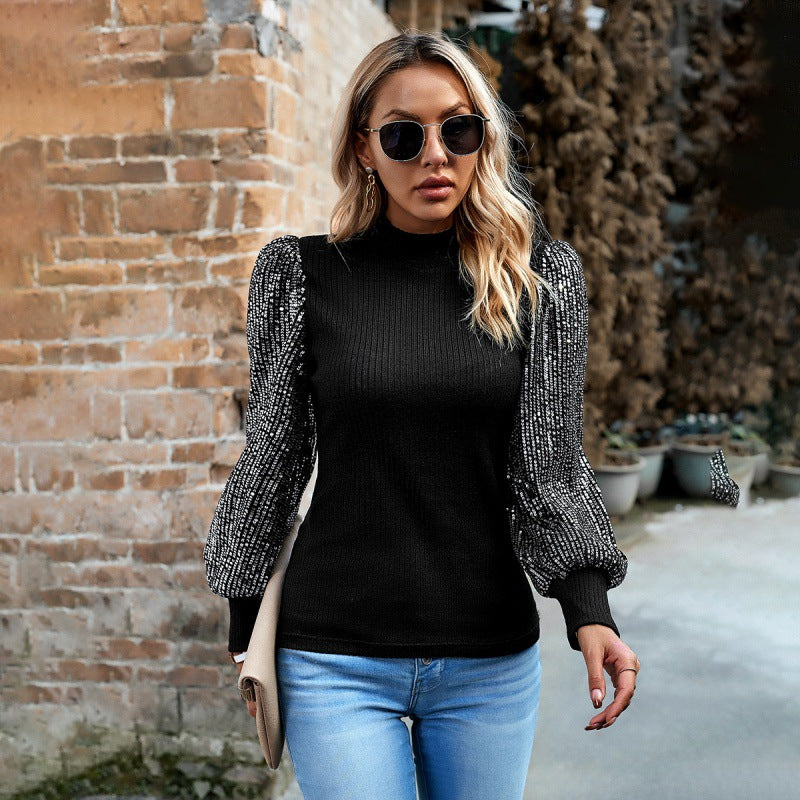 Dame Elegant top med fashionable puffærmer af netstof og fint ribdesign Stilla