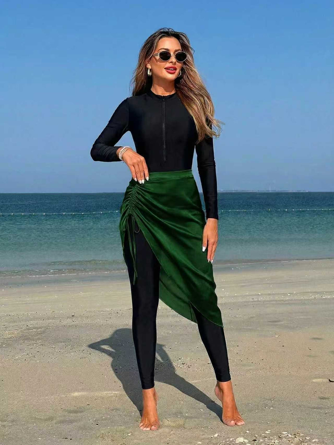 Dame sportslig langærmet badedragt med indpakning skirt Skovae