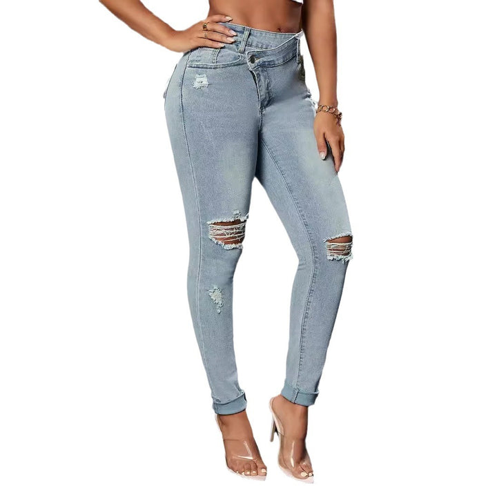 Dame Skinny Jeans med modige distressed-effekter og figurskælgende snit Stilla