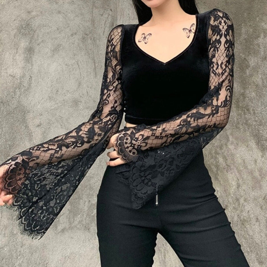 Dame crop-top med elegante spidse ærmer og figursyet snit Skovae