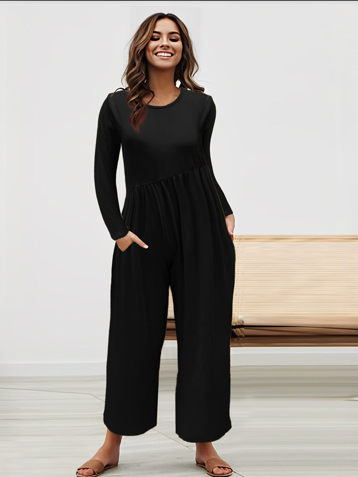 Dame mode jumpsuit med glitrende overdel og vidt skåret ben Stilla