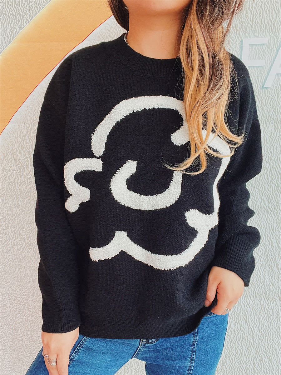 Kvindernes løse sweater med grafisk skrift Stilla