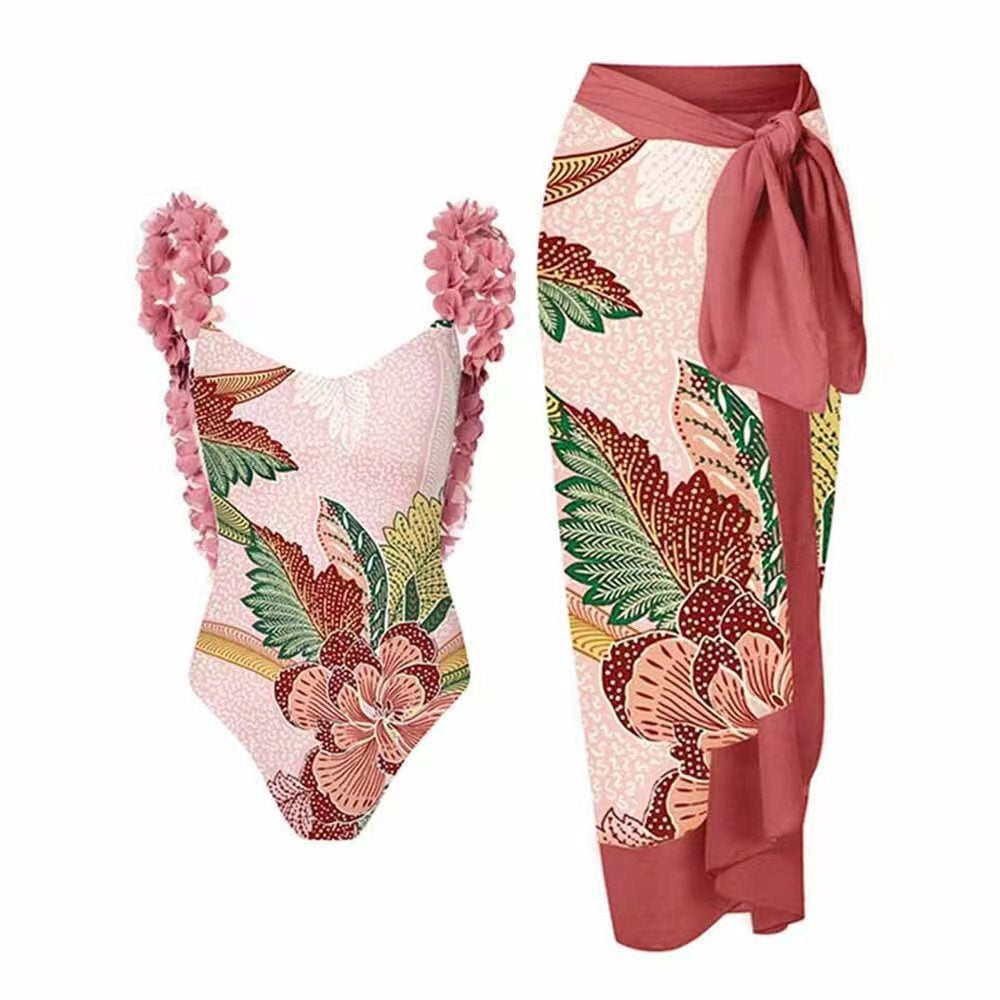 Dame Højskåret Én-delt Badedragt med blomstermotiver og matchende Wrap Skirt Stilla