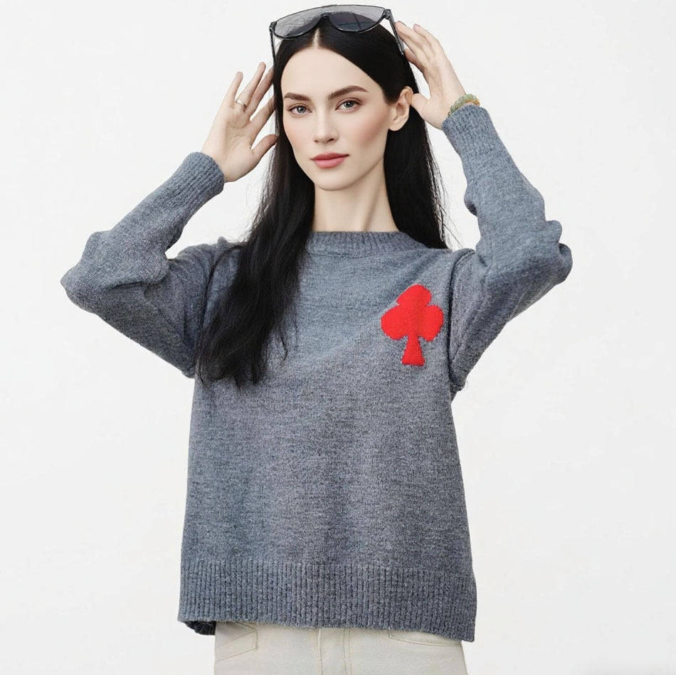 Dame mønsteret kort sweater lavet af blødt strikmateriale med det ikoniske Stilla-logo