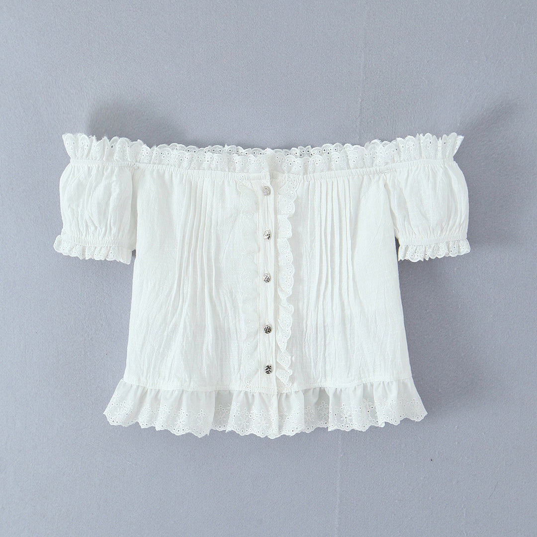 Damer rynket bluse med off-shoulder design og dekorative knapdetaljer Stilla