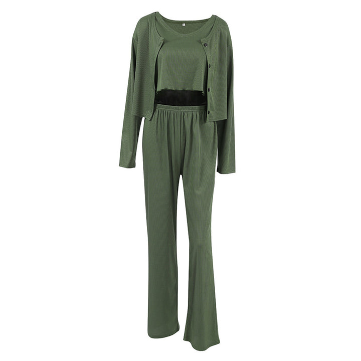 Dame strik-jumpsuit med knapdetalje og brede ærmer Stilla
