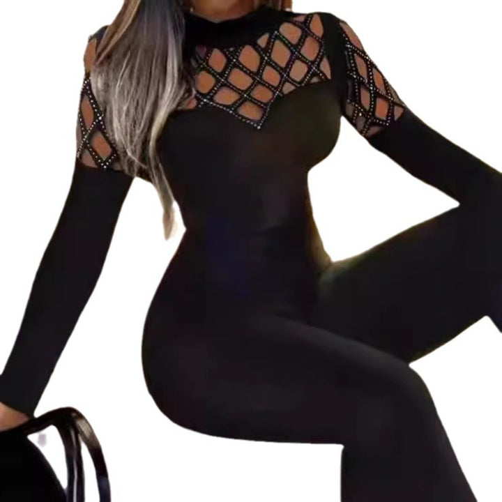 Dame jumpsuit med netlignende udskæringsdesign og elegante dekordetaljer Stilla