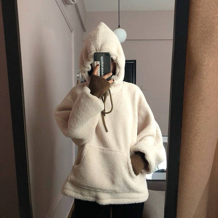 Kvindernes hyggelige oversized hættebluse med frontkangaroo-lomme og elastiske manchetter Skovae