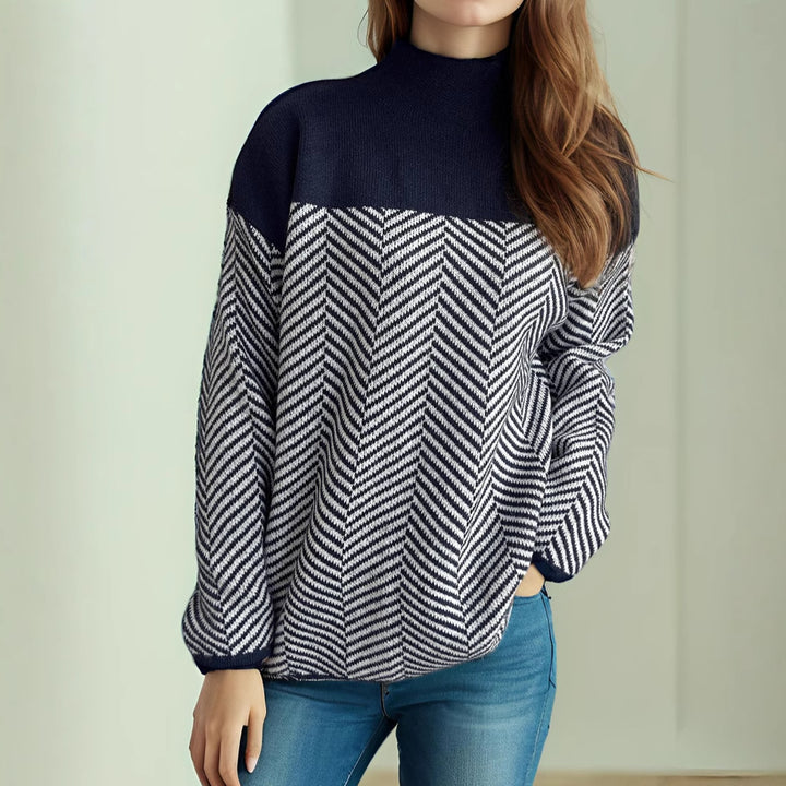 Kvinders hyggelige rullekrave sweater med moderne herringbone mønster og elastiske manchetter Stilla