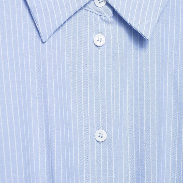 Damebluse med asymmetrisk knude og raffineret drapering Skovae