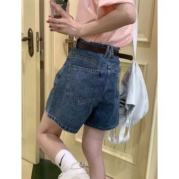 Kvinders denim shorts med høje lommer og løs pasform